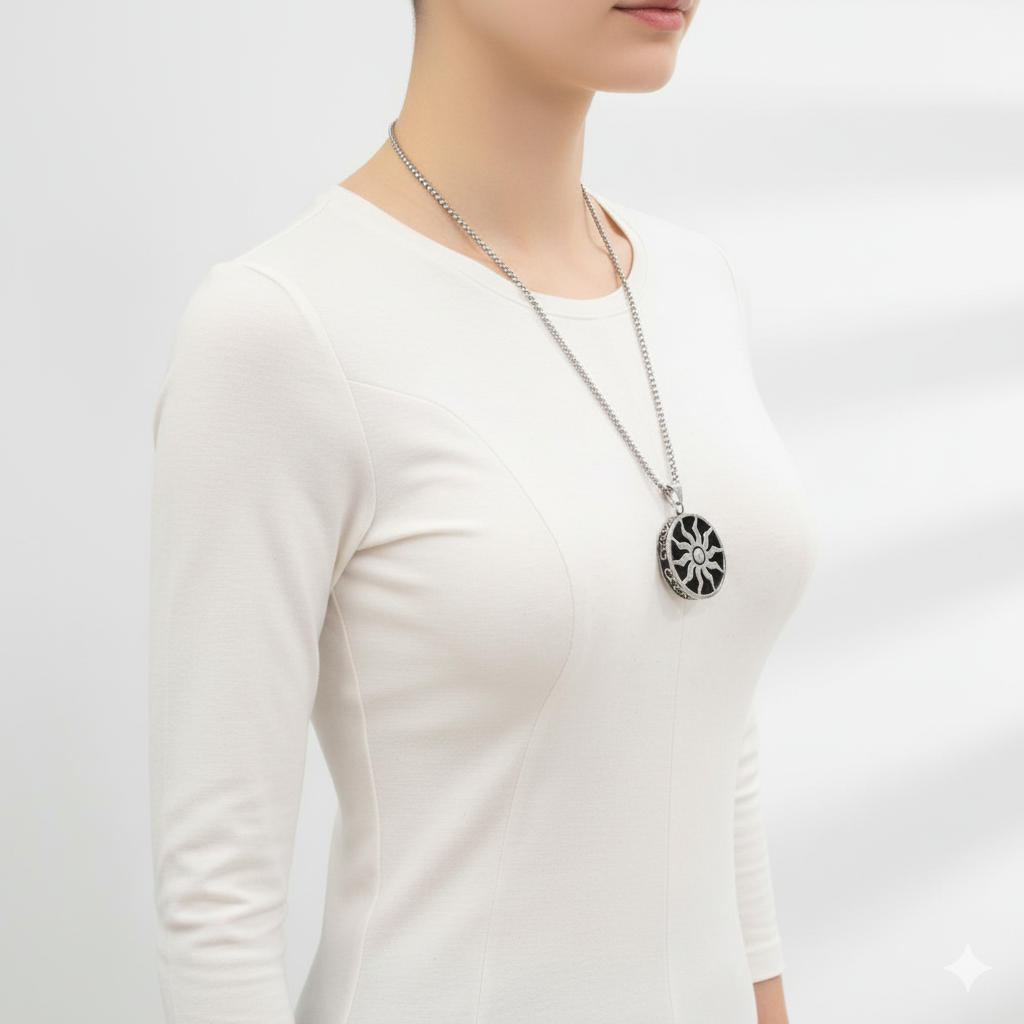 Stainless steel sun medallion necklace worn casually