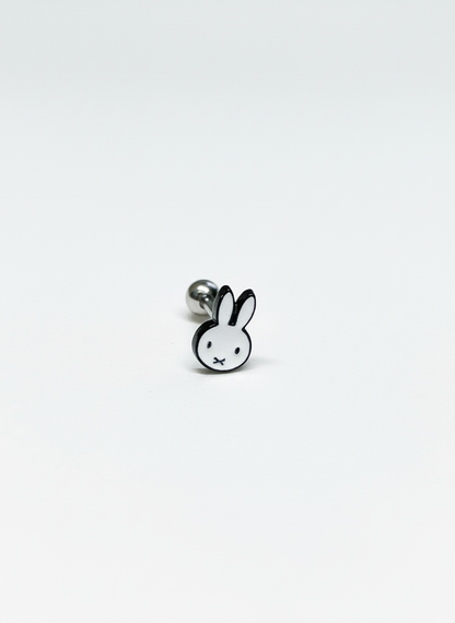 Stainless steel barbell earring with a clean black-and-white Miffy character face design, photographed against a plain white backdrop.