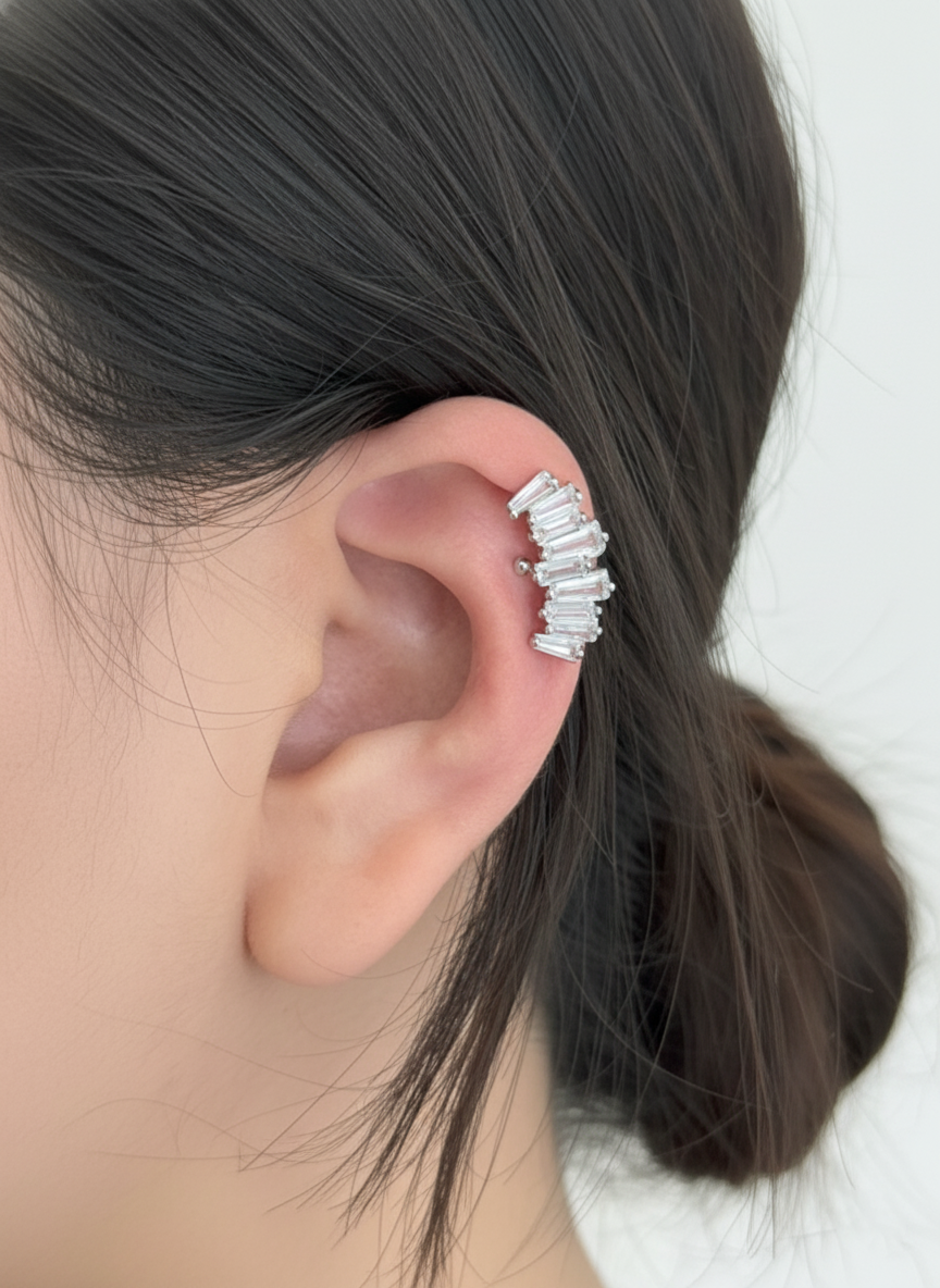 Silver baguette-cut cubic zirconia ear cuff worn on the upper ear, brass material, handmade in Korea.