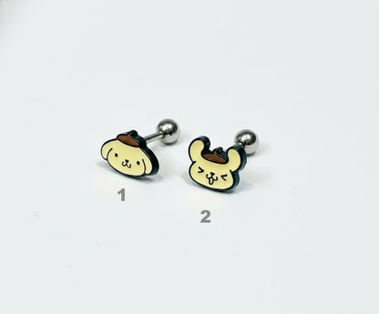 Numbered product image of two Pompompurin piercings — 1 with a neutral face, 2 with a cheerful expression — set on a clean white background.