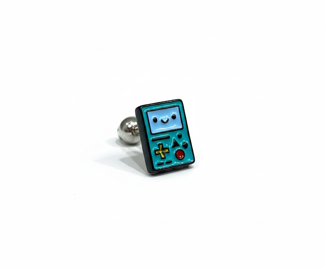Adventure Time BMO enamel earring in teal, shaped like a handheld console with yellow, red, and green buttons