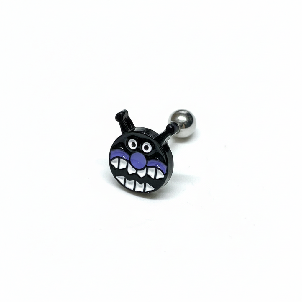 Black Baikinman barbell earring with wide toothy grin on white background.