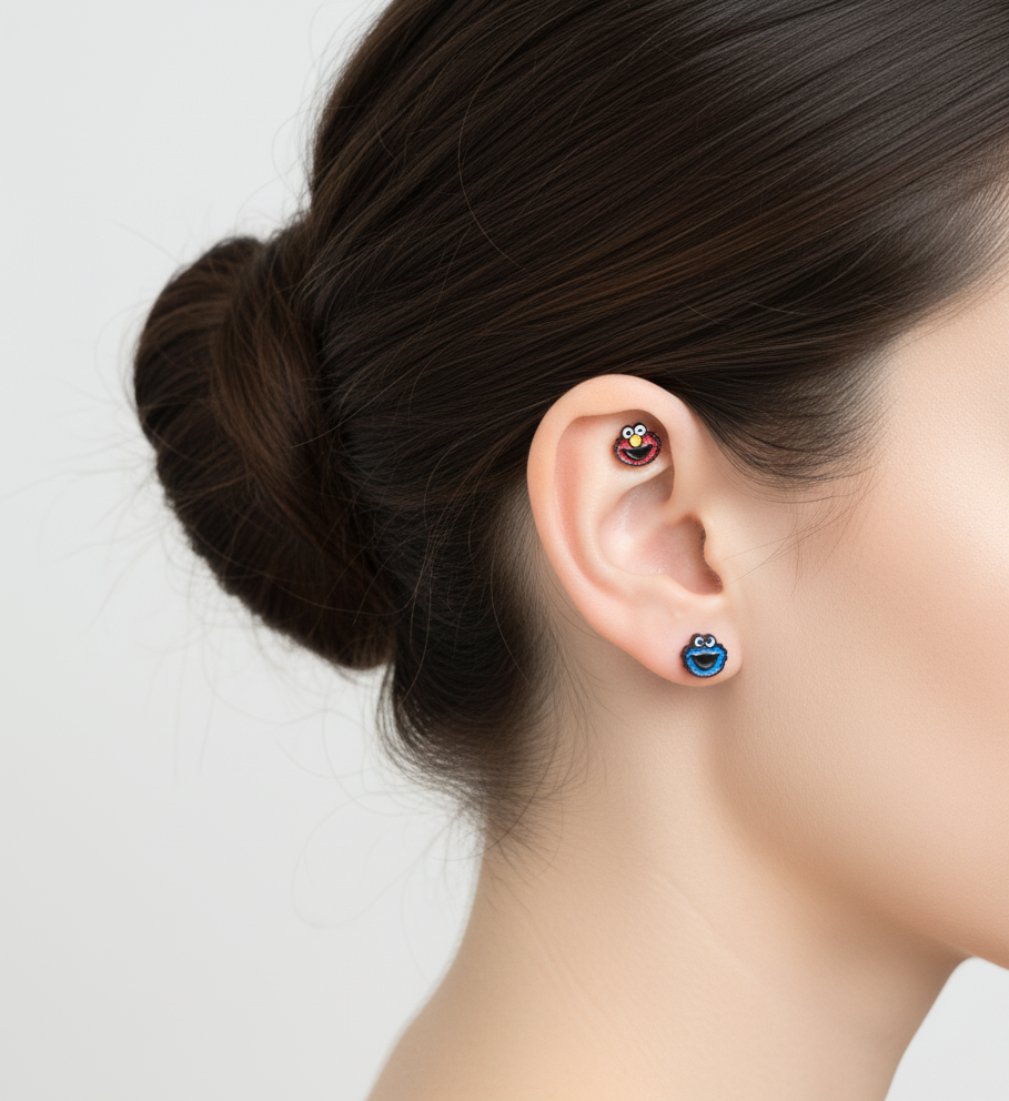 Sesame Street earrings worn on ear Elmo Cookie Monster mix and match