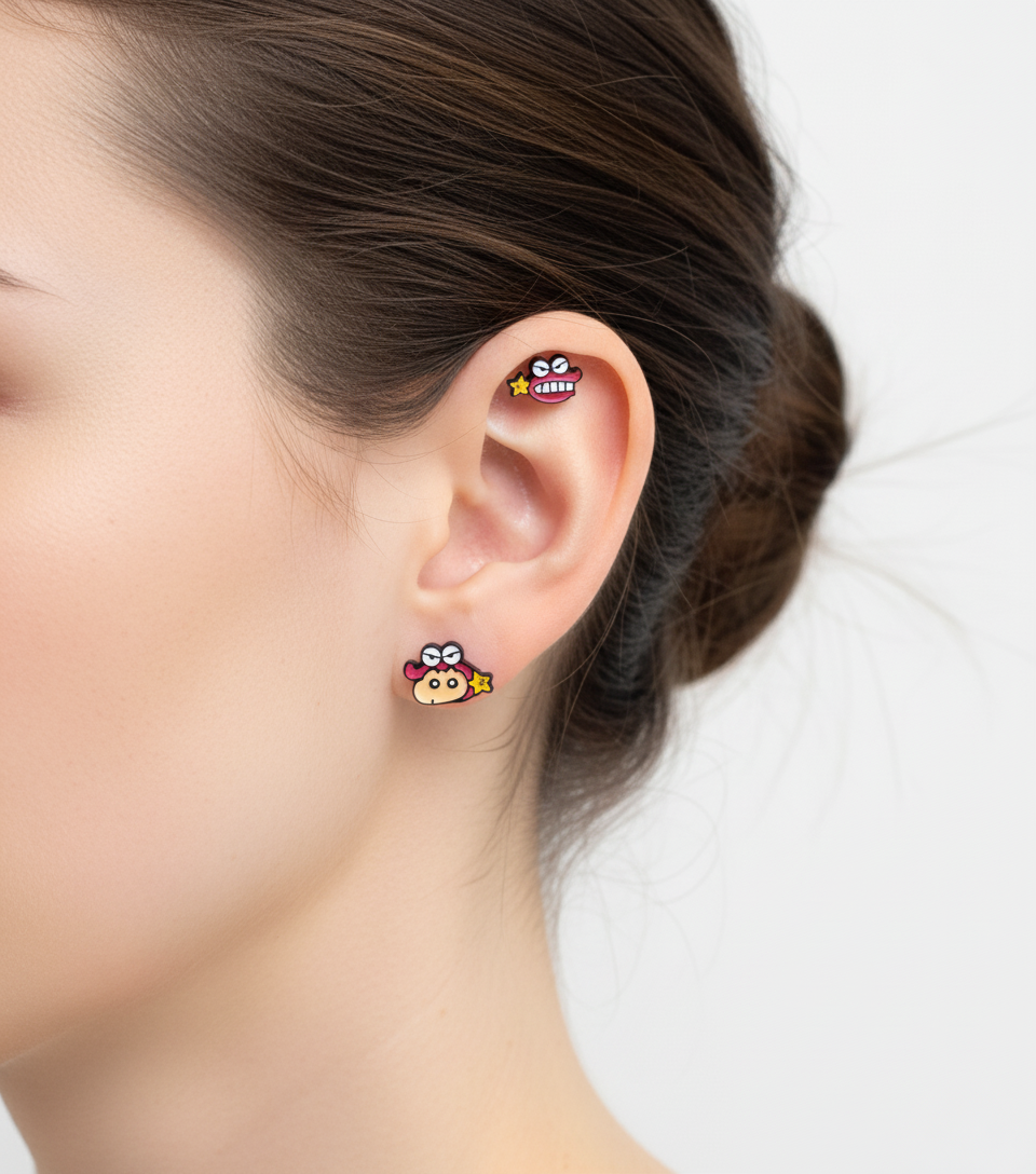 Mismatched pair styling - Crayon Shin-chan on lobe and Waniyama dinosaur on helix cartilage