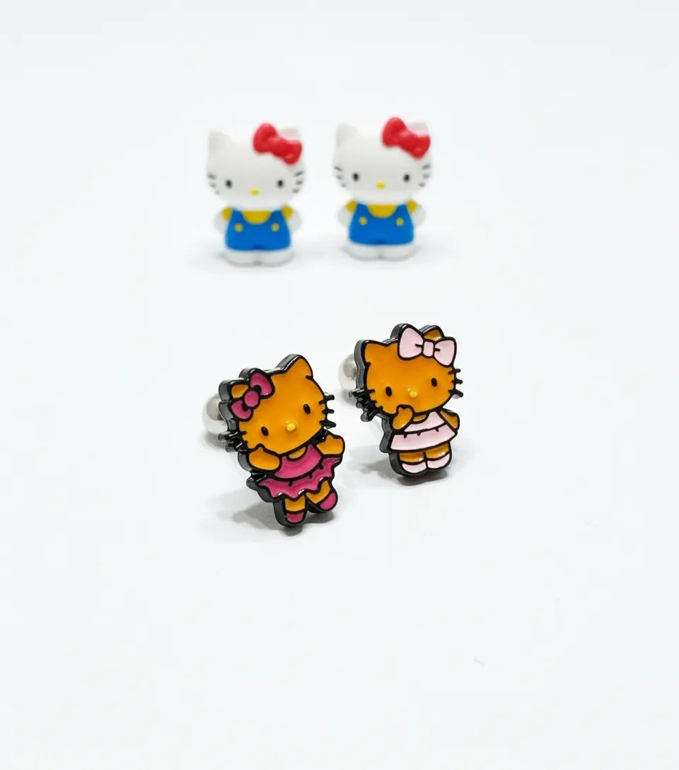 Urban kitsch Hello Kitty tanning balletcore piercing product flat lay — dark pink tutu and baby pink dress versions, handmade in Korea by 8ttitto8.