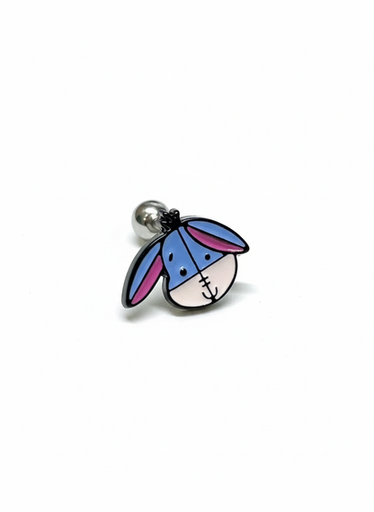 Eeyore character barbell earring placed alone on a white background with round steel backing.