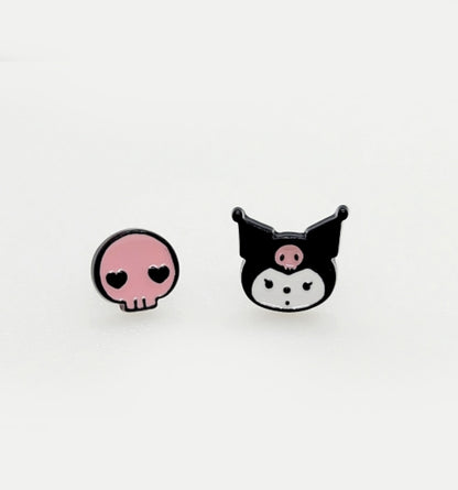 Pink skull with heart eyes and Kuromi face enamel stud earrings on white background, playful goth kawaii mismatched pair, black and pink Sanrio character design, 925 silver posts hypoallergenic, Korean handmade jewelry