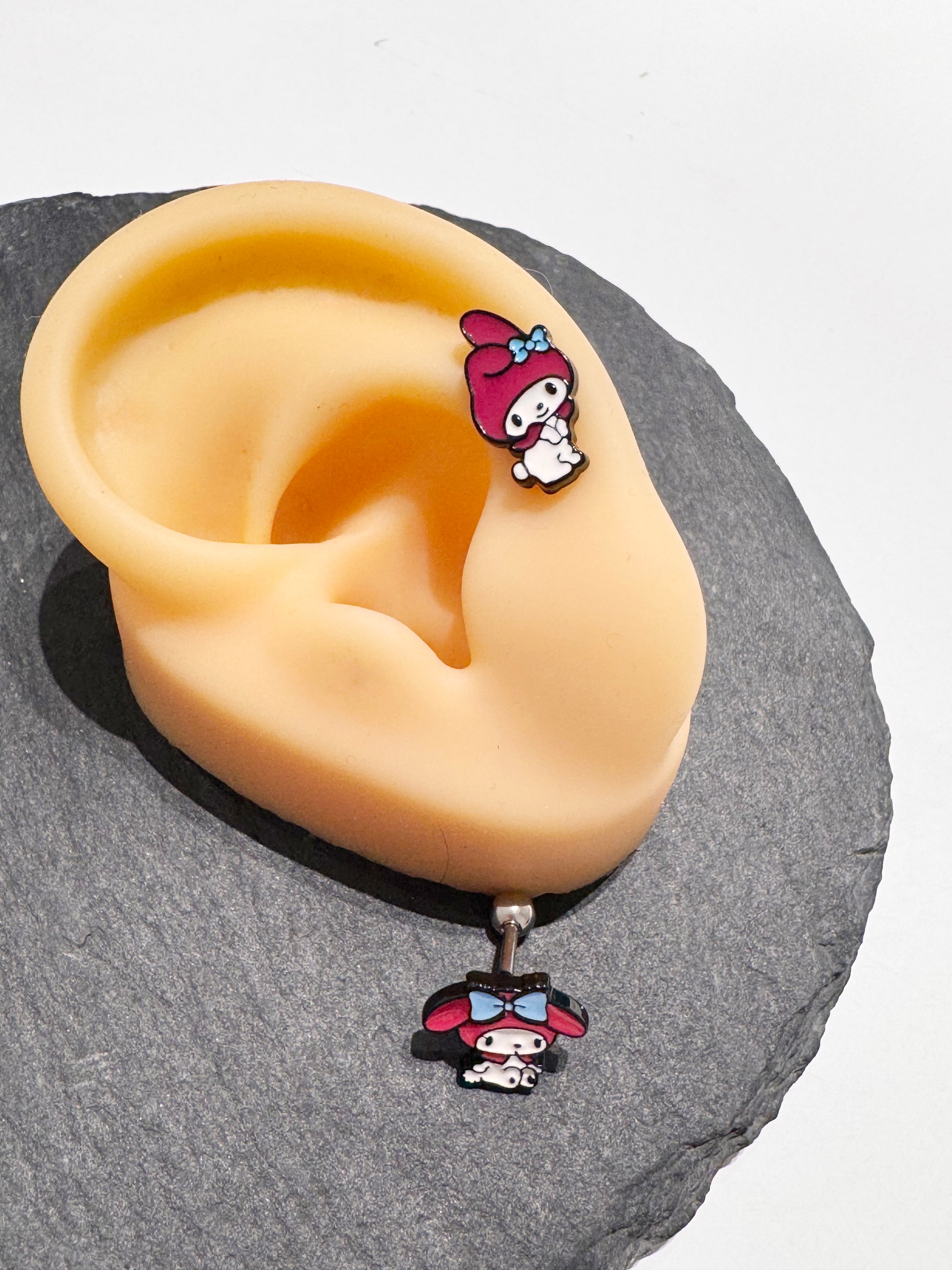 Surgical steel My Melody barbell earrings close up detail