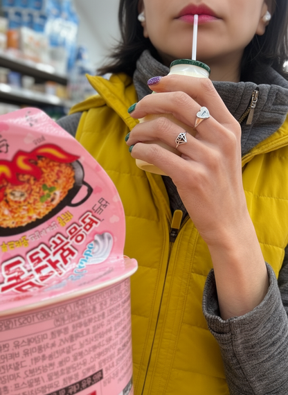 Geometric Silver Ring with Buldak Spicy Noodles - Korean lifestyle product photography showing ring on hand