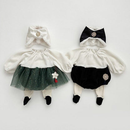 Korean baby hanbok outfits with white and black jobawi bonnets, featuring cream blouses, green tulle skirt and black bloomers with pearl brooches
