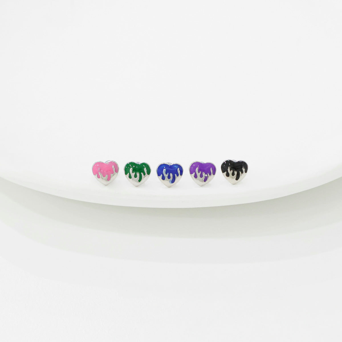 Melting heart stud earrings labeled 1-5 showing color selection from pink to black