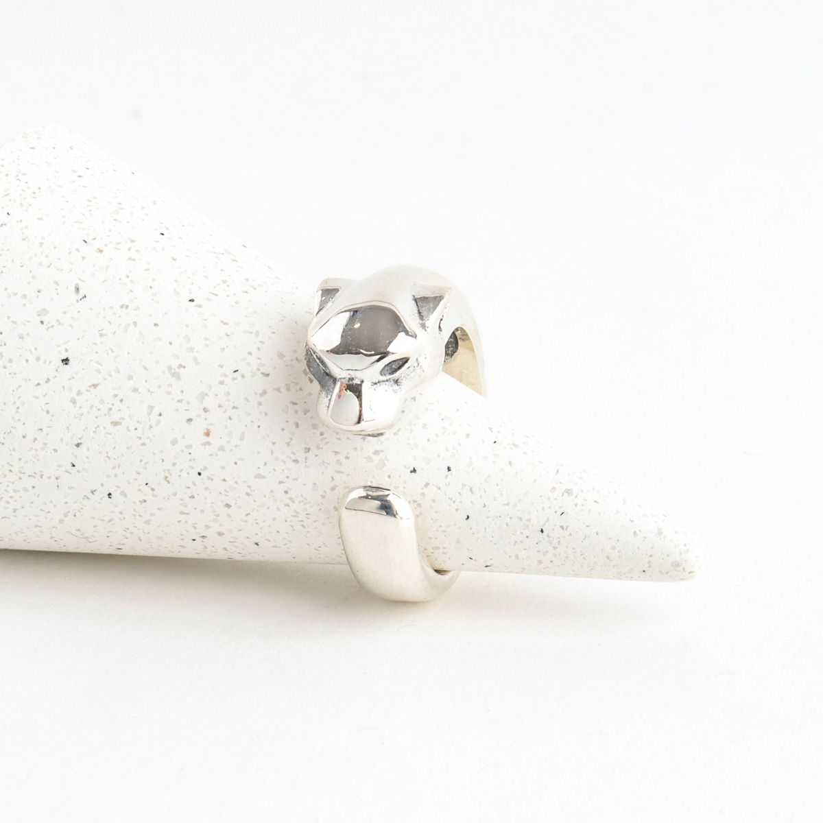 Flat lay of 925 silver panther head ring front view showing detailed animal motif