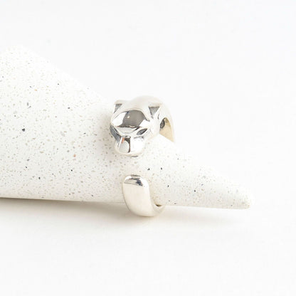 Flat lay of 925 silver panther head ring front view showing detailed animal motif