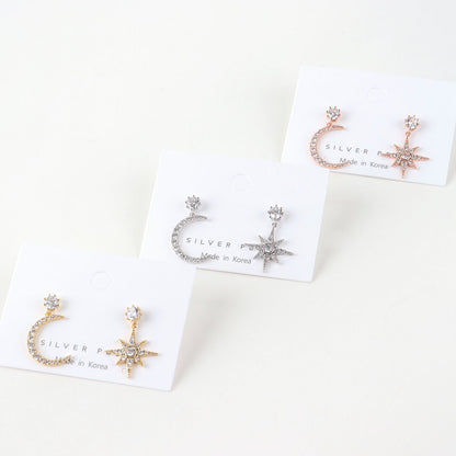 Packaging display of moon star earrings in three colors