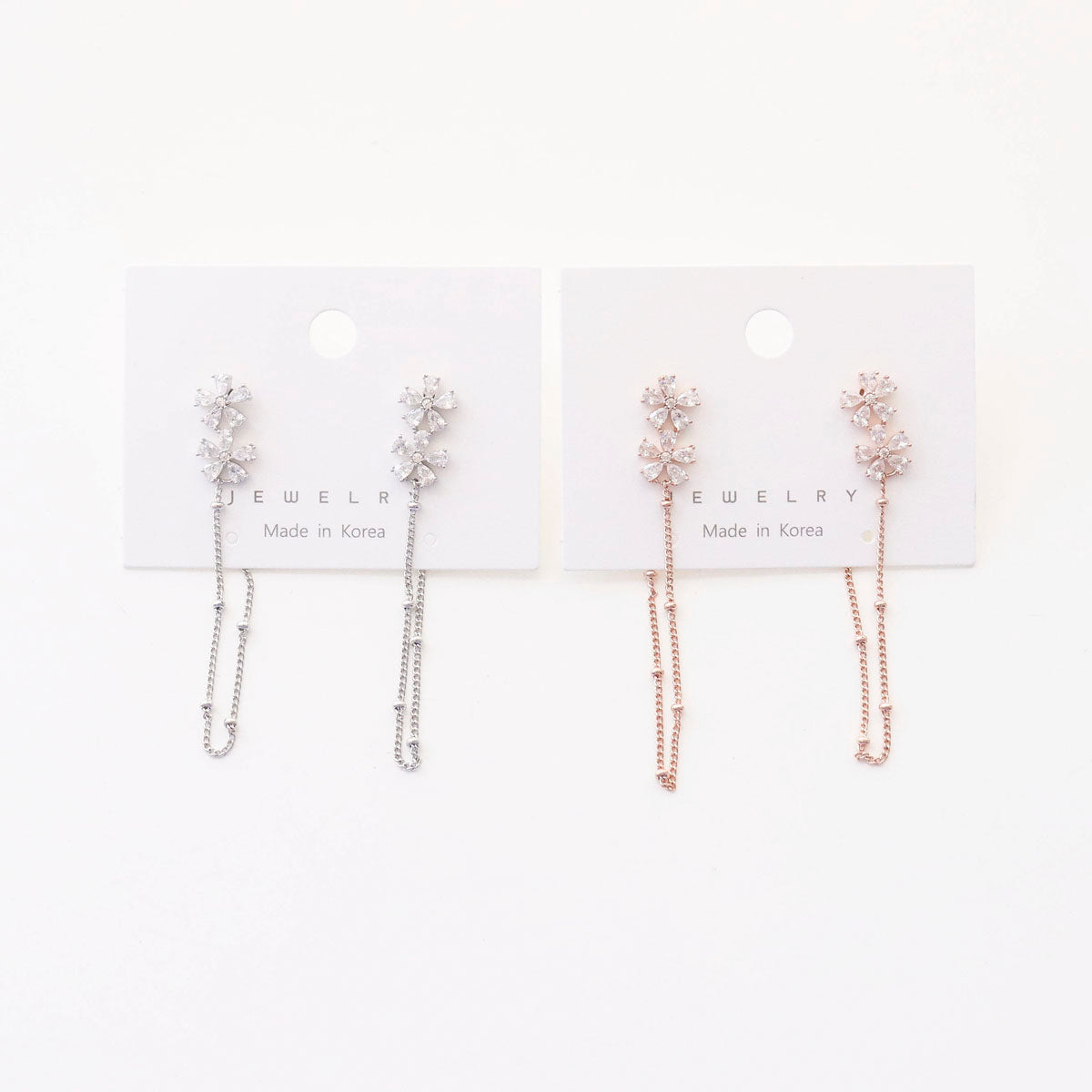 Product card showing Made in Korea jewelry - silver and rose gold versions