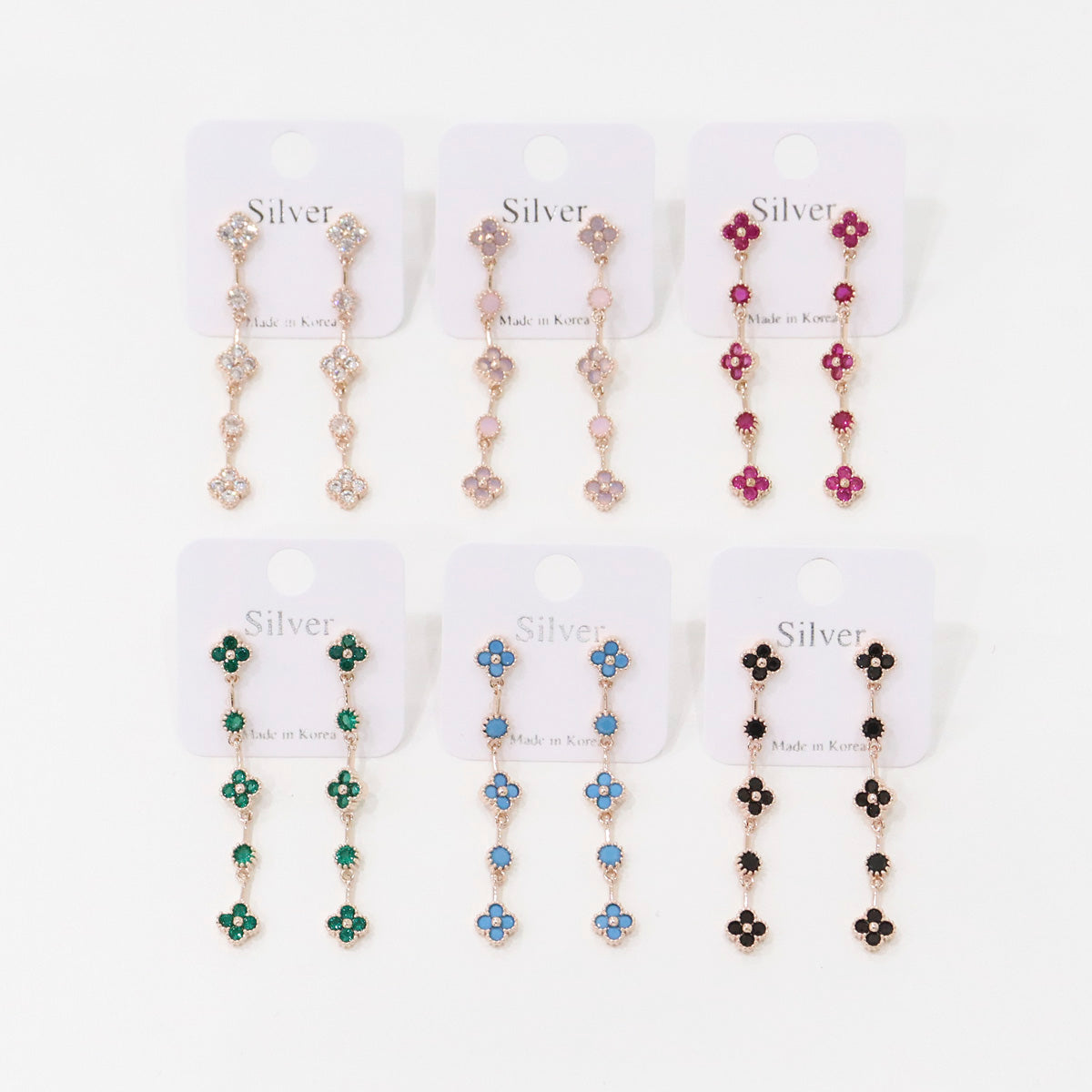 Complete collection of clover drop earrings in 6 colors: crystal, pink, ruby, emerald, turquoise, black