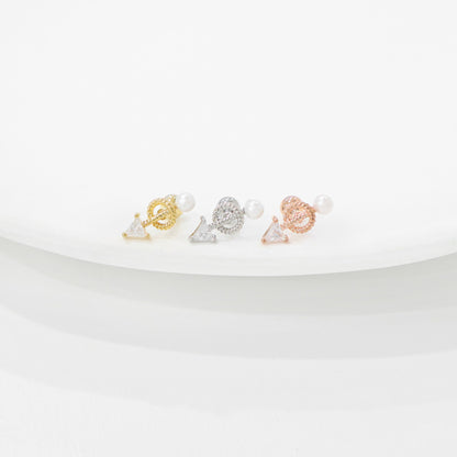 Product comparison photo of vintage pearl drop arrow barbell earrings in gold, silver, and rose gold finishes