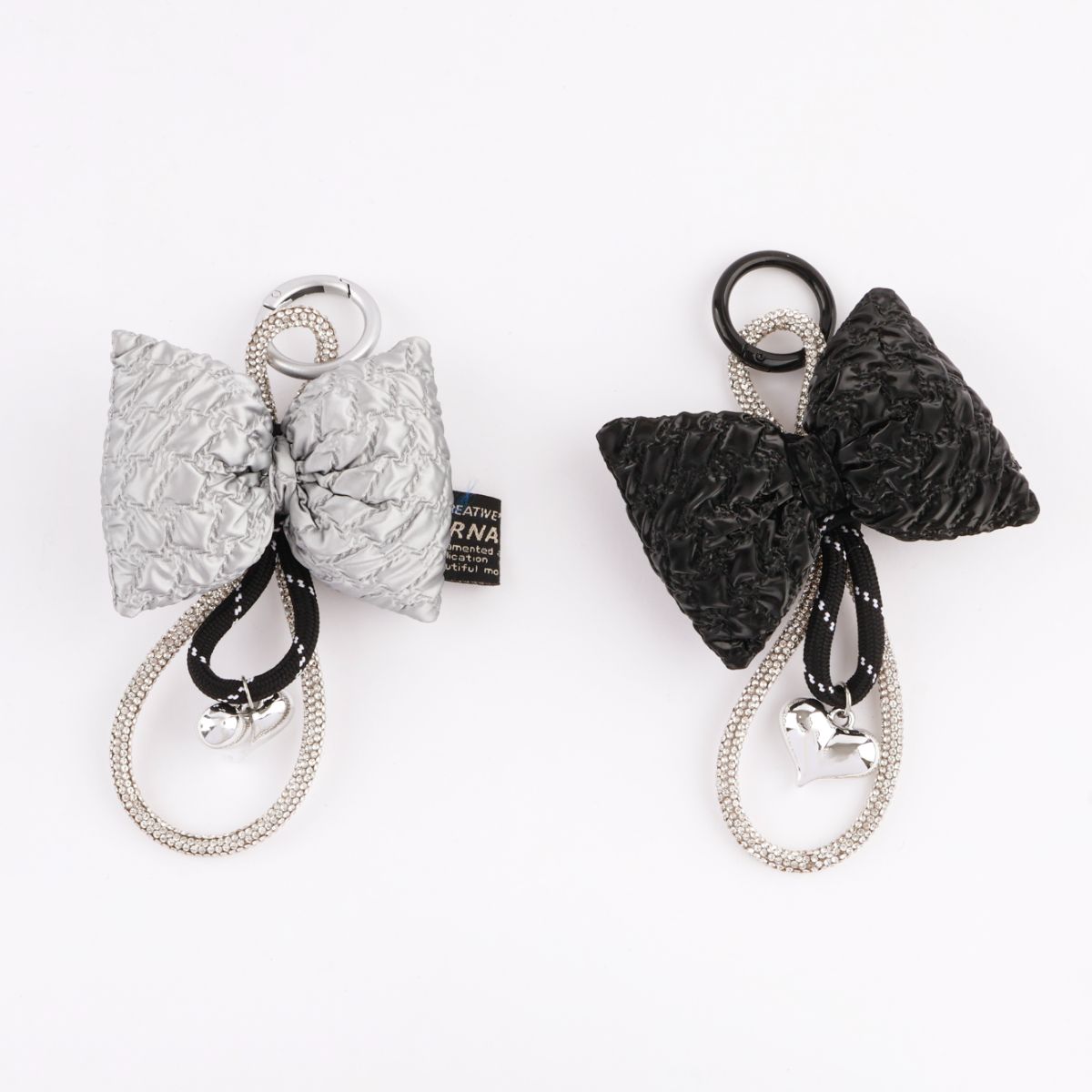 Black and silver puffy bow bag charms side by side comparison handmade in Korea