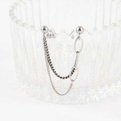 Surgical steel double barbell chain earrings with oval and curb chain links on white background