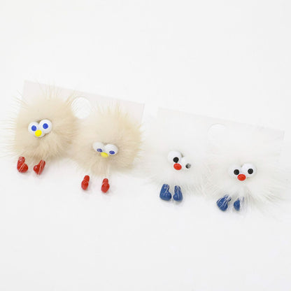 Four fluffy character earrings in beige and white with blue and red feet, displayed in a row.