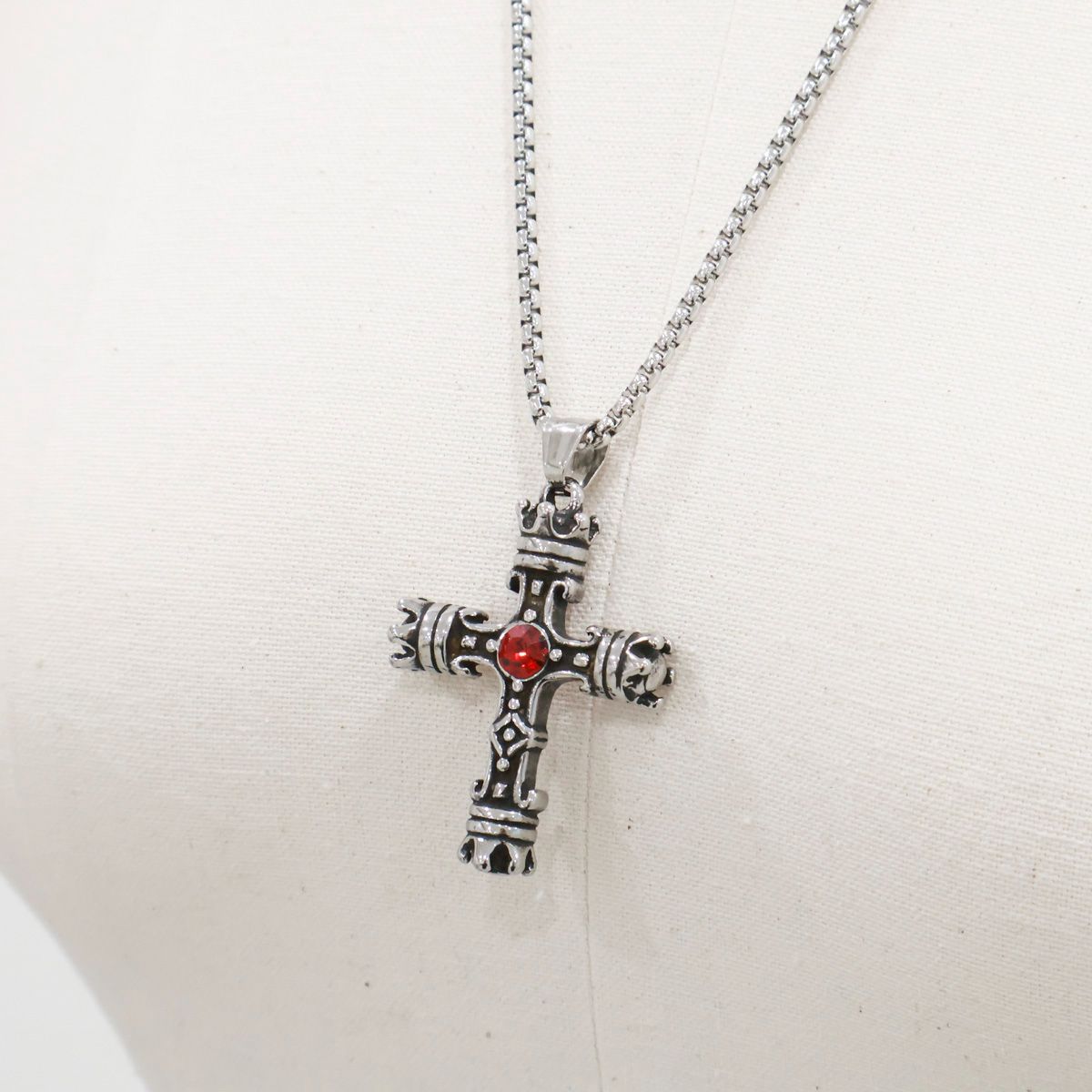 Stainless steel gothic cross necklace close-up