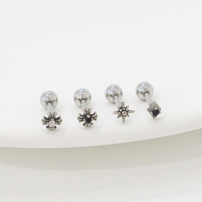 Size comparison image showing three star-themed barbell earrings beside a clear ruler. Focus on length and charm size for accurate product info.