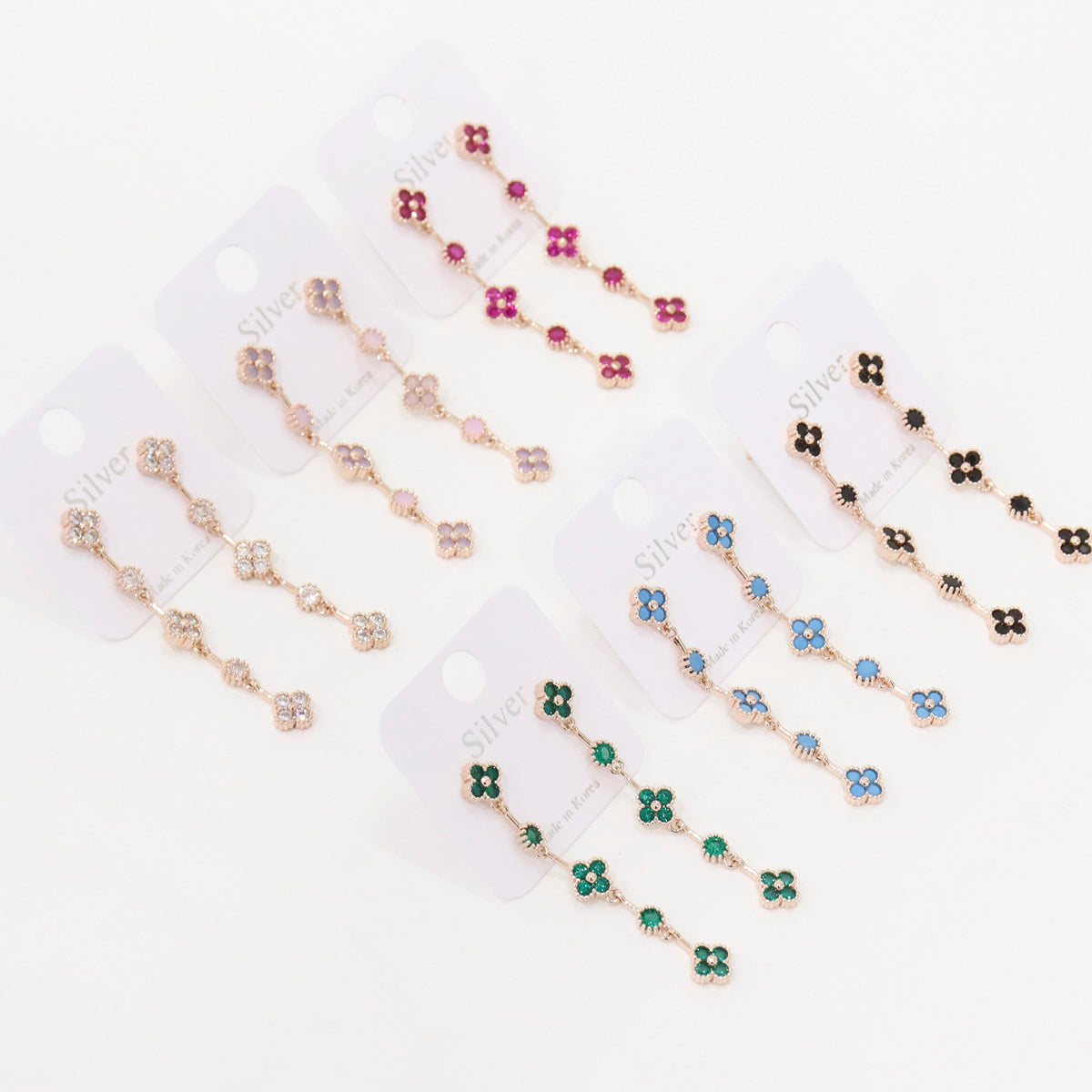 Complete collection of clover drop earrings in 6 colors: crystal, pink, ruby, emerald, turquoise, black