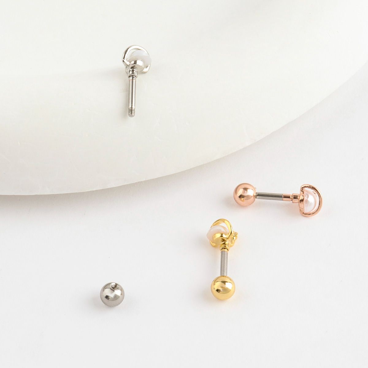 Saturn Planet Pearl Orbit Barbell Piercing with Star Detail - Surgical Steel