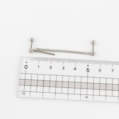 Size measurement of chain connected piercing showing 5-6cm chain length with ruler