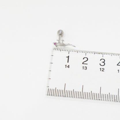 Gecko lizard piercing size measurement with ruler showing approximately 10mm length, tiny animal stud dimensions