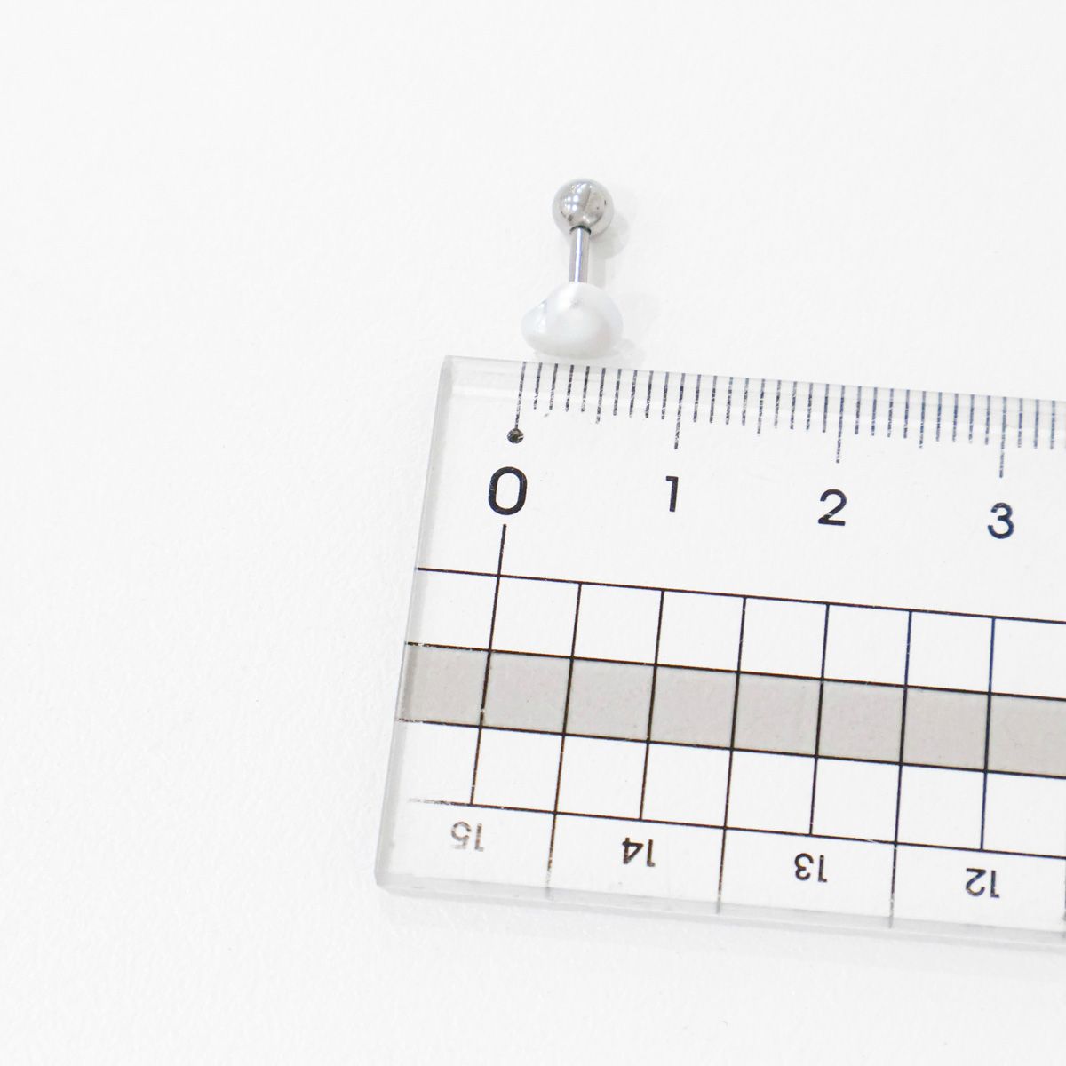 Aurora heart pearl barbell size measurement with ruler showing dimensions