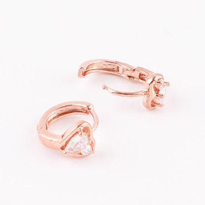 Rose gold huggie hoop earrings in open and closed positions, highlighting heart stone and hinge mechanism.