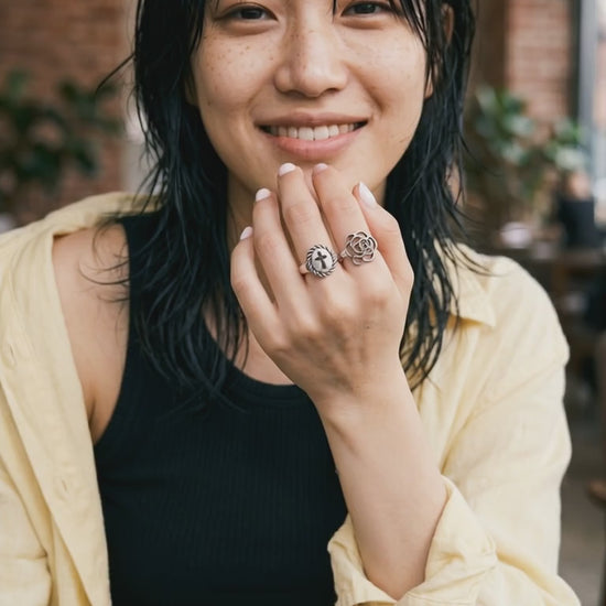 K-fashion bold ring look model wearing 925 silver camellia openwork ring layered hair effortless grunge-floral aesthetic 8ttitto8