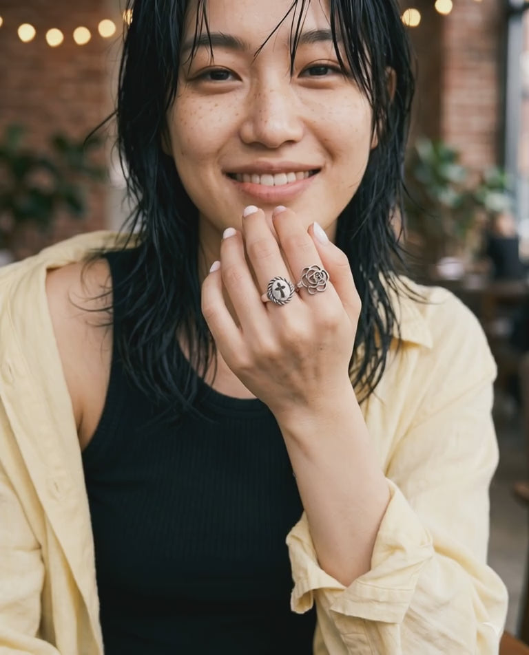 K-fashion bold ring look model wearing 925 silver camellia openwork ring layered hair effortless grunge-floral aesthetic 8ttitto8