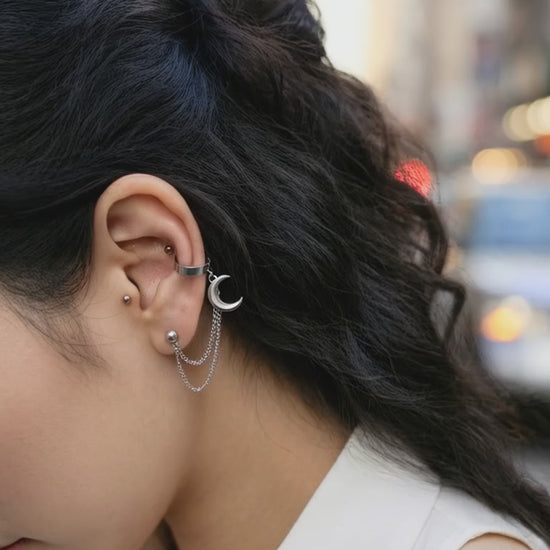Street style look with surgical steel moon connected chain piercing and white shirt