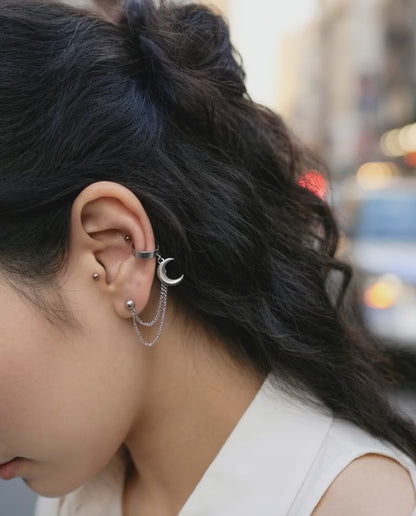 Street style look with surgical steel moon connected chain piercing and white shirt